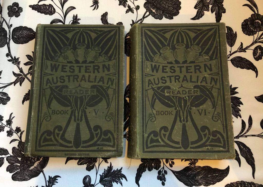Two olive green, cloth covered books. Titled Western Australian Reader. Books V and VI. Published by the Western Australia Department of Education. Vintage books published 1932 and 1945.